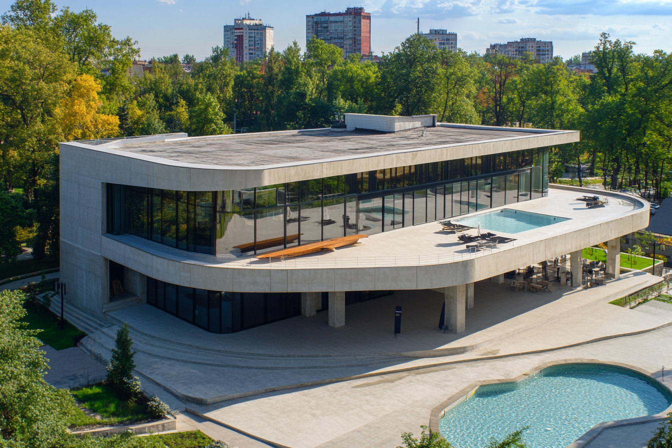 Modern concrete building with pool, store, offices, hotel.