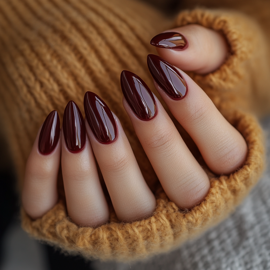 Photo of tan woman showing off new nails.