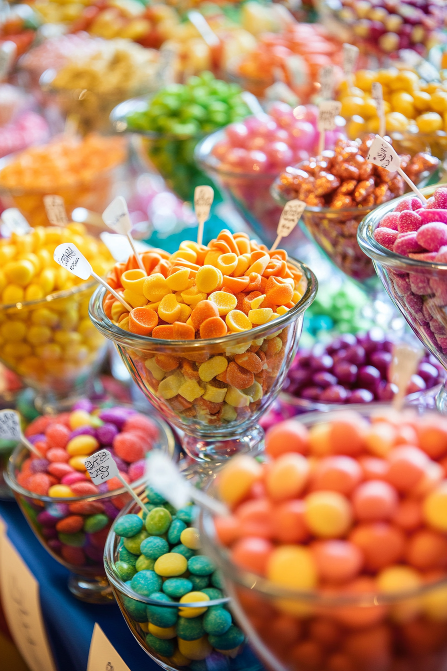 Colorful Candy Buffet Table Display with Interactive Selection