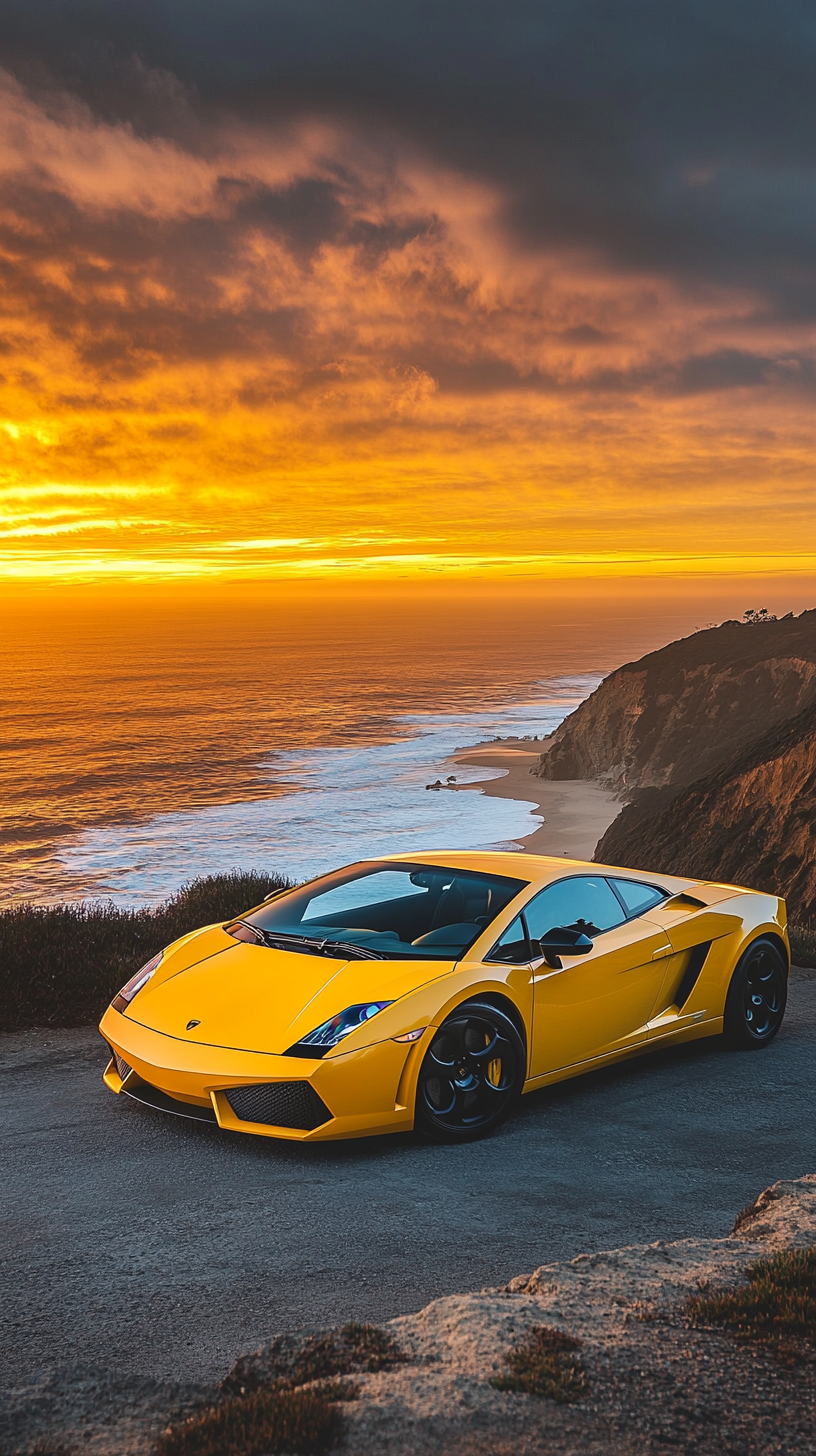 Yellow Lamborghini on cliff with ocean waves and sunset.